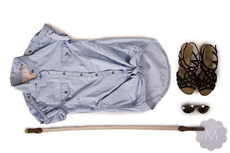 Damska koszula jeansowa jasno niebieska przetarta 