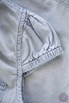 Damska koszula jeansowa jasno niebieska przetarta 