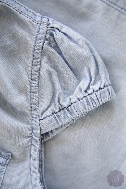 Damska koszula jeansowa jasno niebieska przetarta 