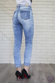 Spodnie damskie jeansowe rurki jasno niebieskie wytarte z jetami firmy Karostar (K-13164)
