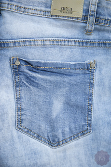 Spodnie damskie jeansowe rurki jasno niebieskie wytarte z jetami firmy Karostar (K-13164)